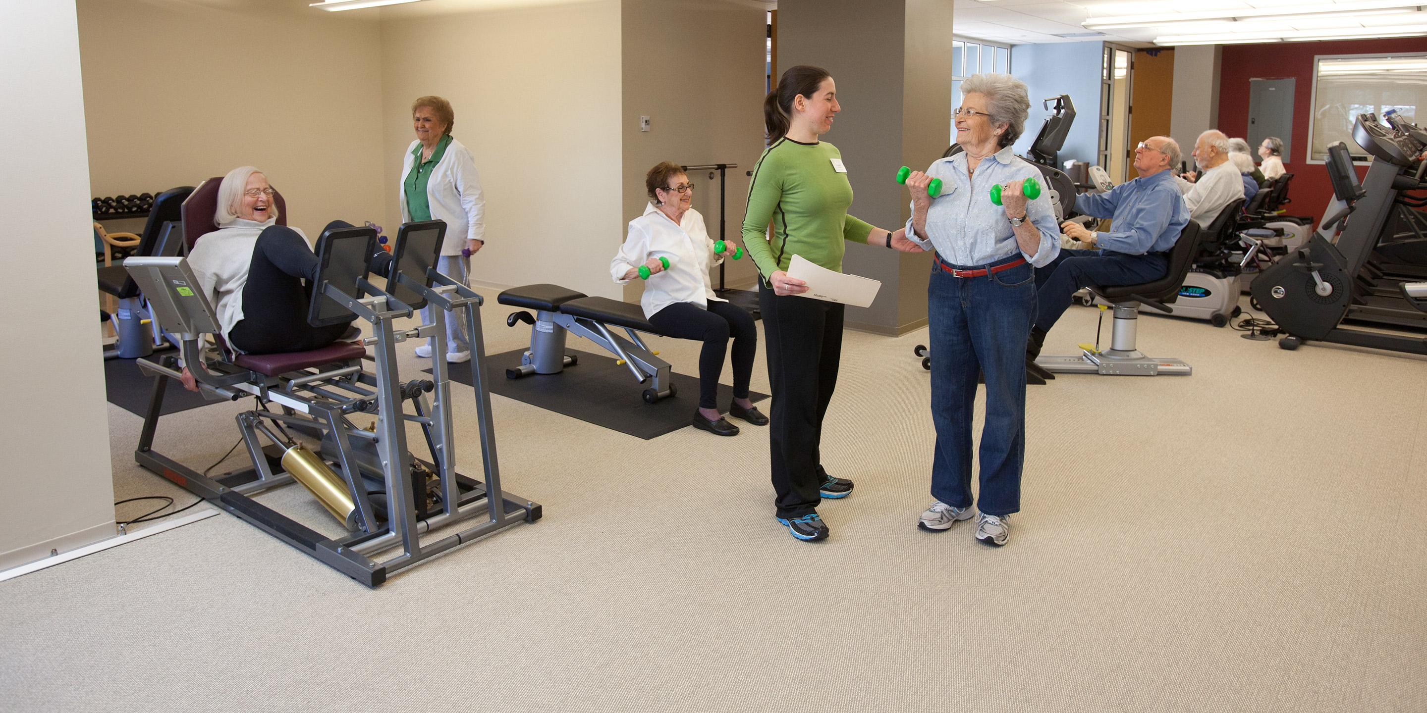 Patients at HRC workout separately in a gym 