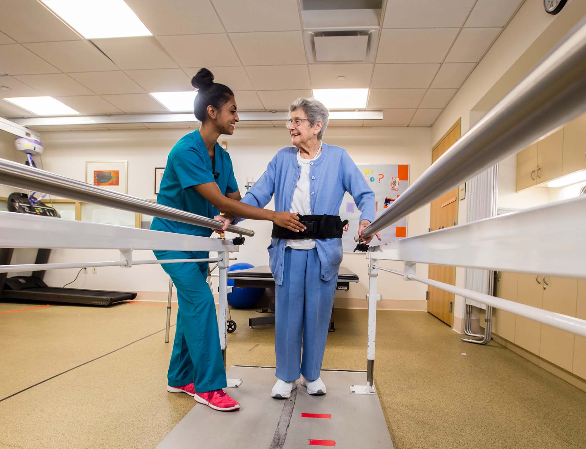 Woman Nurse with Woman Patient