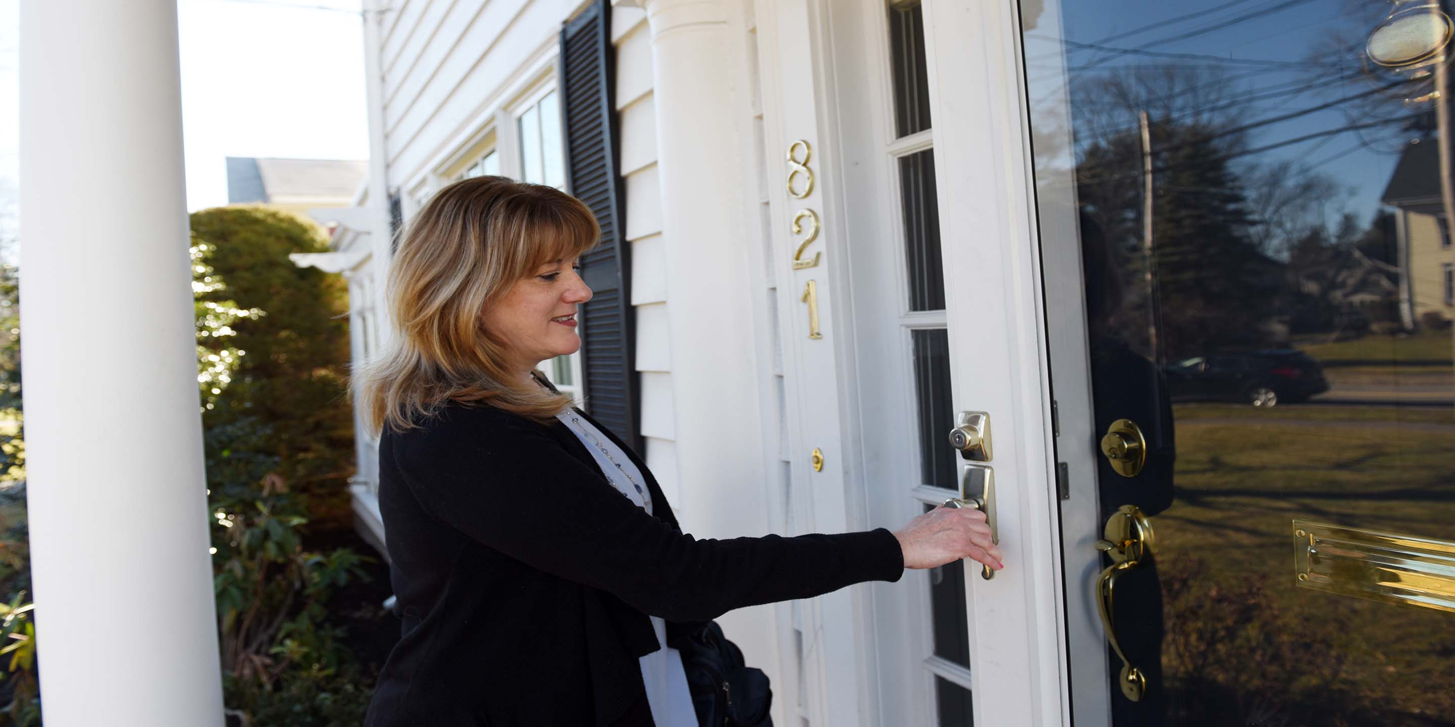 Woman caretaker visiting home