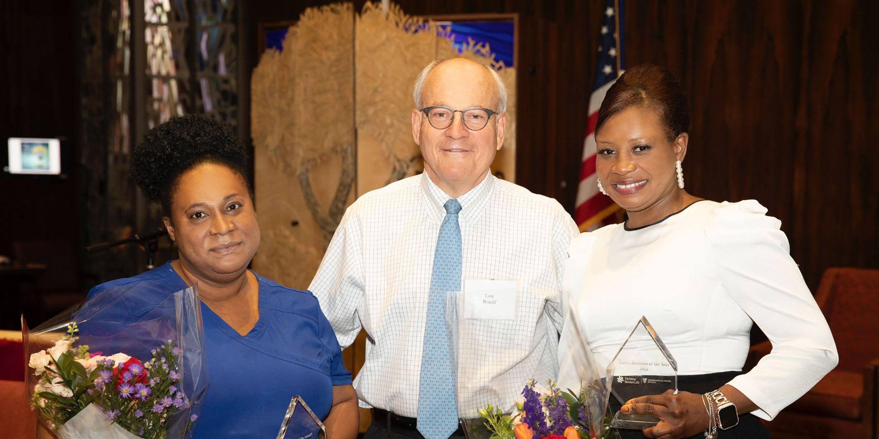 Hebrew SeniorLife Nurse of the Year Carline Cenat (left) with President Lou Wold (center) and Certified Nursing Assistant of the Year Dadie Petit-Frere.