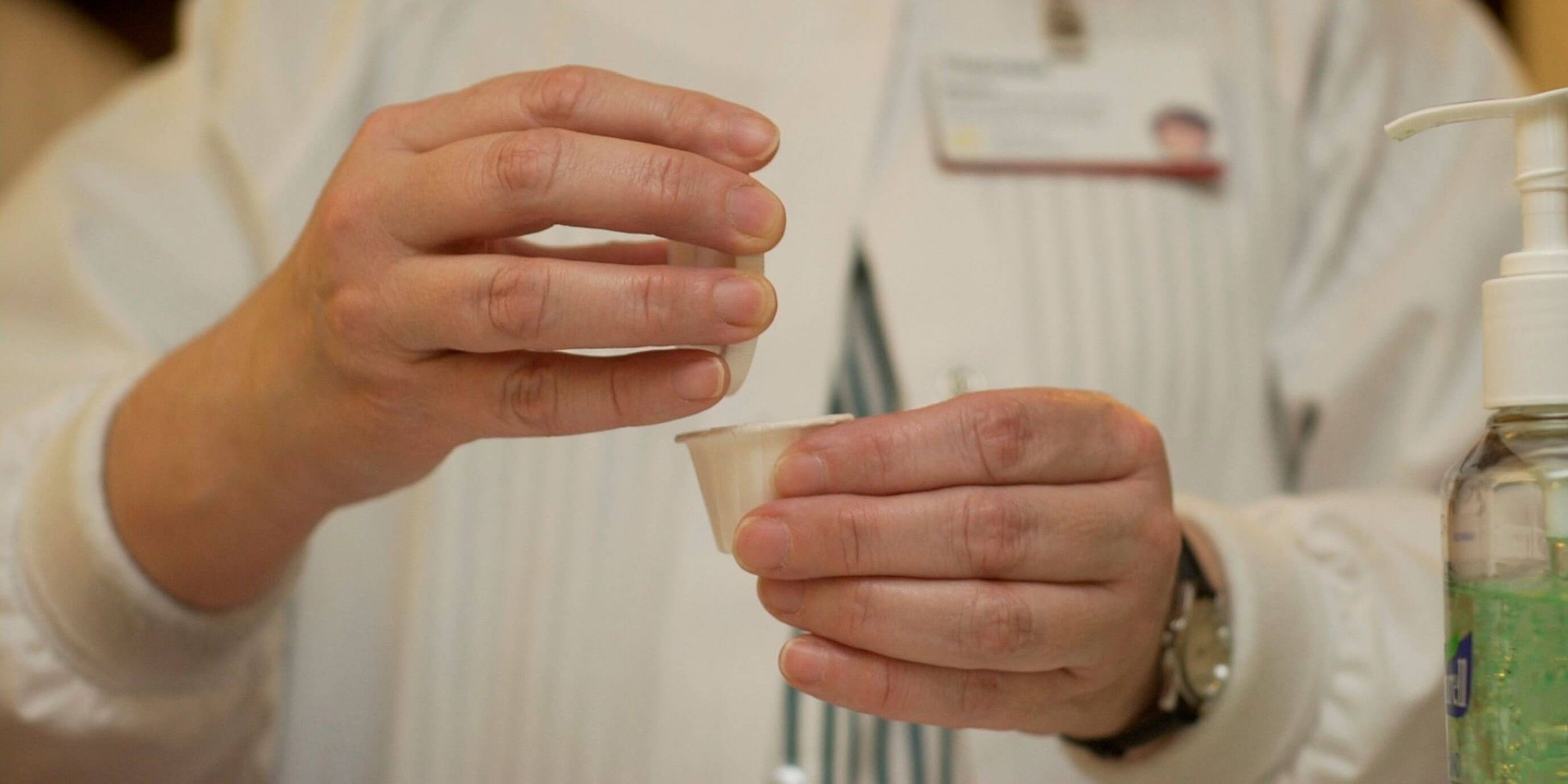 Male doctor setting up antisychotic medication