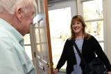 Home Care worker entering senior's home