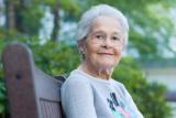 Senior woman sitting outside