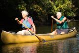 Two seniors in a canoe