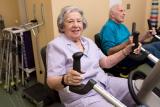 Older woman and man doing exercises