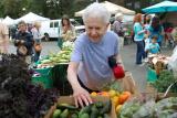 Older woman shopping at a farmer's market