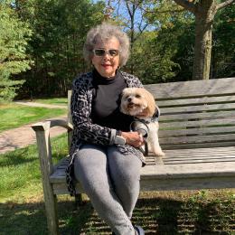 Woman sitting with her dog