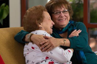 mother and daughter hugging