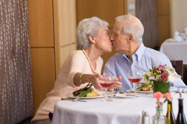 Senior couple having dinner