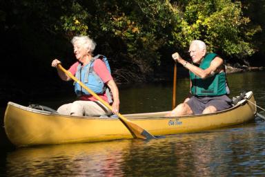 Two seniors in a canoe