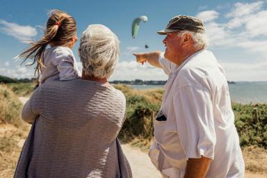 Older couple with young girl