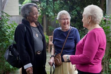 3 Older women standing together