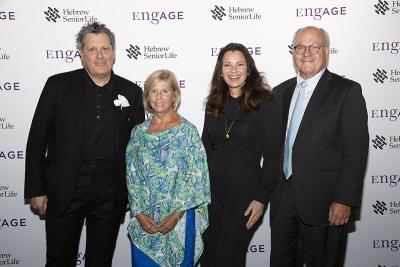 EngAGE 2022 featured fashion designer Isaac Mizrahi (left) and actress Fran Drescher (second from right) along with Hebrew SeniorLife president Louis J. Woolf and his wife, Sarah Woolf.