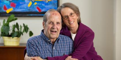 Adult children hugging