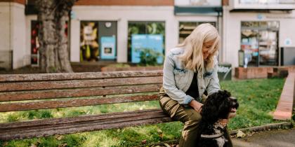 Woman sitting with her dog