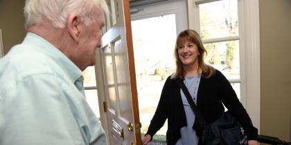 Home Care worker entering senior's home