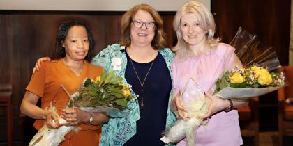 Nurse and CNA of the Year holding flowers