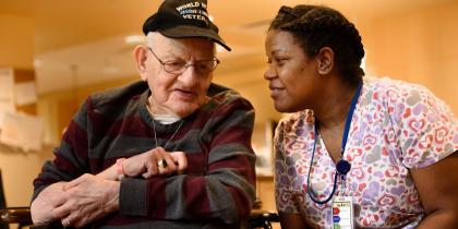 Nurse sitting with Veteran