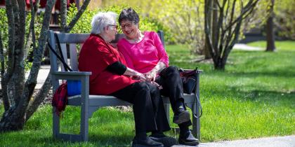 Older women sitting outside together