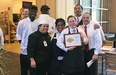 Members of the NewBridge Culinary team receiving the HSL ROCKS! award.