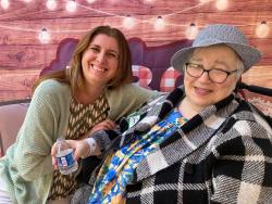 Staff member smiling with patient 