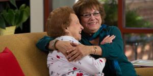 mother and daughter hugging