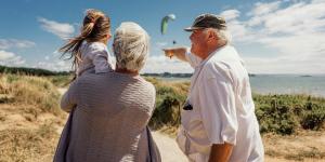 Older couple with young girl