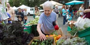 Older woman shopping at a farmer's market