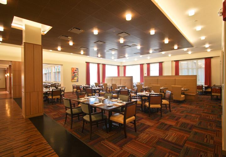 Large open dining area with large windows NewBridge's fine dining restaurant.