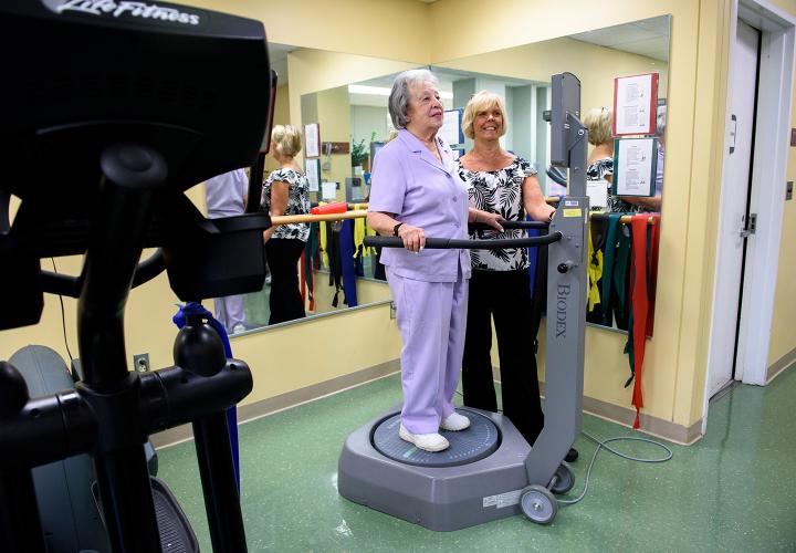 An older woman exercises at Hebrew Rehabilitation Center in Boston as part of our supervised Get Up & Go fitness program.
