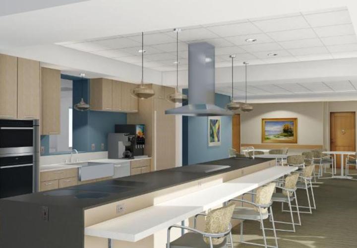 : The recently renovated kitchens in memory assisted living at NewBridge on the Charles feature an open plan, luxury finishes, and noise-absorbing design.