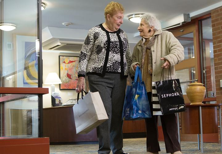 Two Center Communities of Brookline residents return from a shopping trip in nearby Coolidge Corner