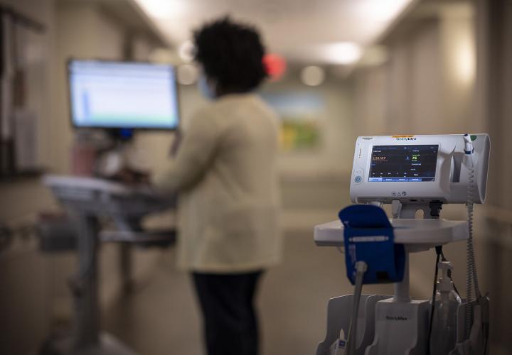 Nurse in front of computer